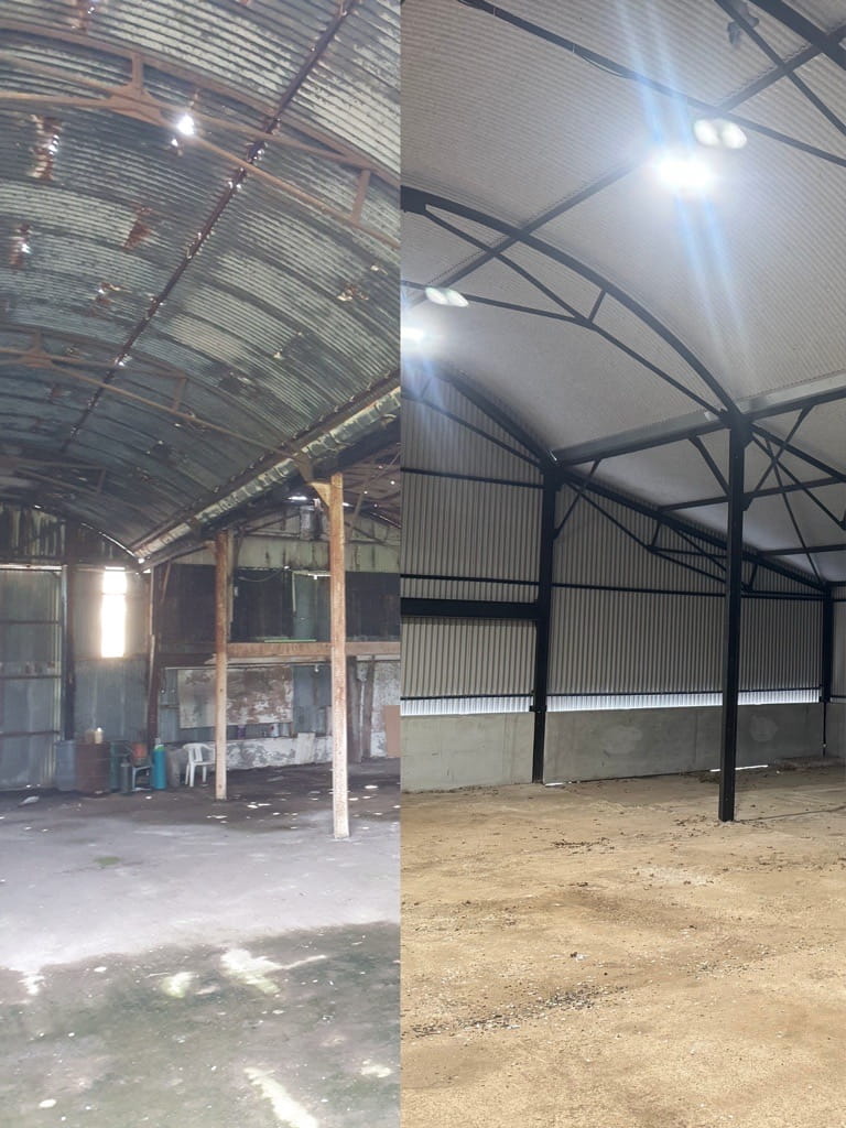 Internal refurbishment of steal beams, columns, rafters and cladding in an agricultural building juxtaposed to the original.